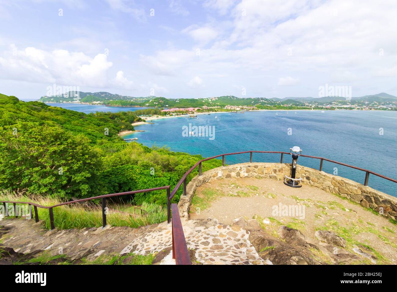 panoramic sky and  panoramic landscape and panoramic sea view of a tropical bay and beautiful green landscape from a view point at the top of Fort Rod Stock Photo