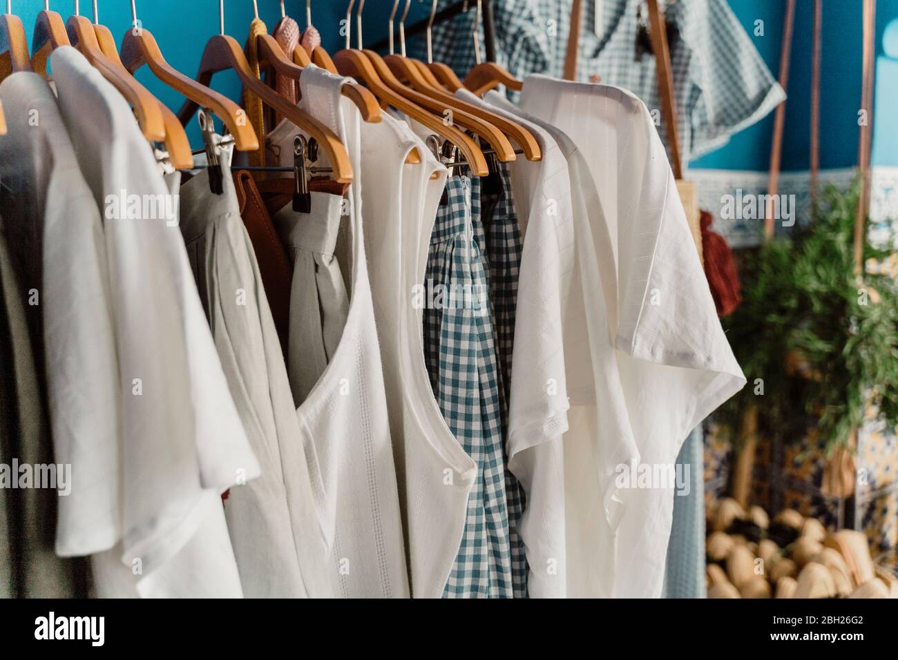 Morocco, T-shirts and tank tops hanging on clothes rack Stock Photo