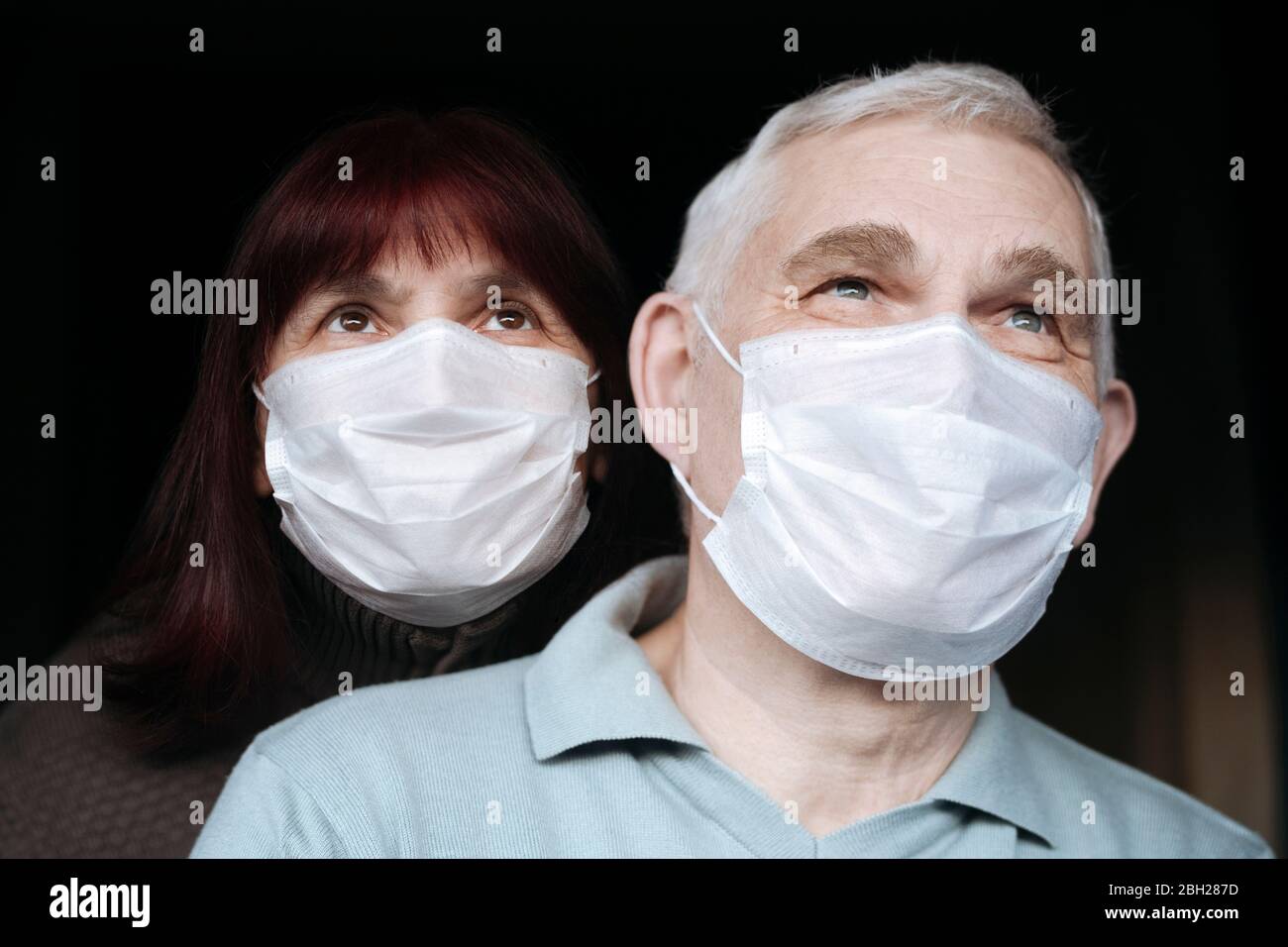 Couple with masks hi-res stock photography and images - Alamy