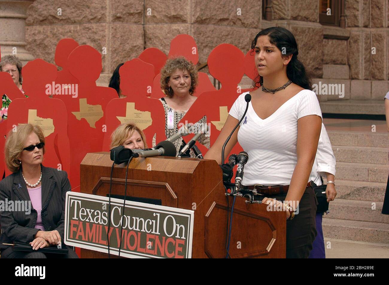 Austin, Texas USA, October 4, 2005: Texans rally at the State Capitol to remember the 115 women killed in 2004 by their intimate partners as part of the Texas Council on Family Violence's 'Silent Witness' campaign. Survivor Angela Catalina De Hoyos speaks. ©Bob Daemmrich Stock Photo