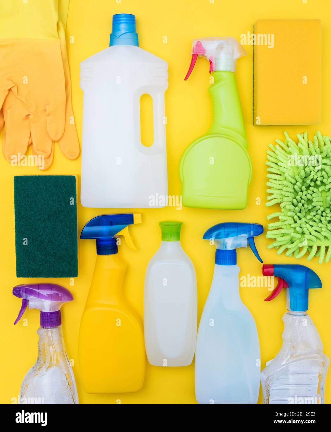 Cleaning spray bottles and cloth lay flat composition Stock Photo