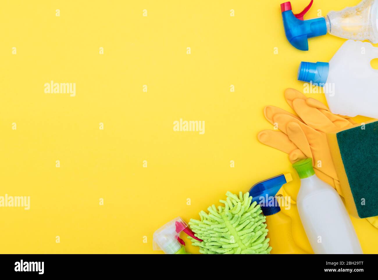 Cleaning spray bottles and cloth lay flat composition Stock Photo