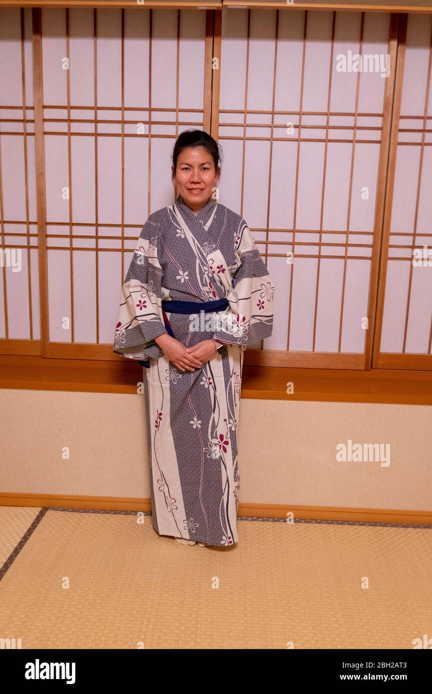 A tourist woman in Japanese dress yukata in the oriental hotel in Lake Kawaguchiko, Japan February 9,2020 Stock Photo