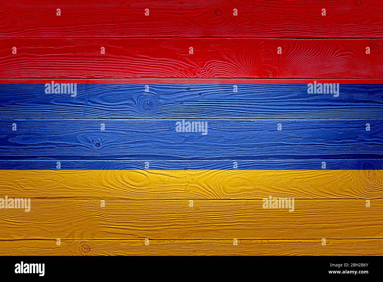 Armenia flag painted on old wood plank background. Brushed natural ...