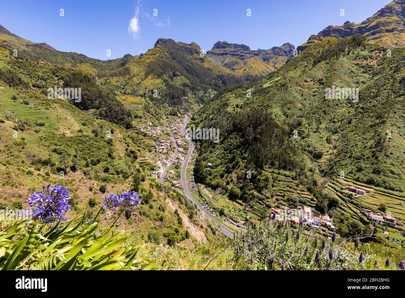 Portugal, Madeira, Serra de Agua, High angle view of village in green mountain valley Stock Photo