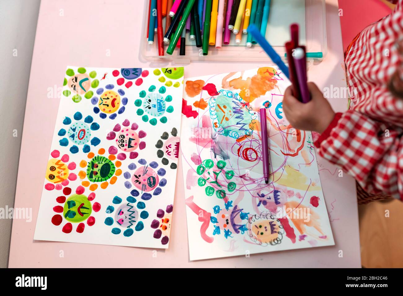 Creative workshop for kids. Sharp coloured drawing pencils, markers on  table. Embroidery fabric with hand embroidered colorful elements. Kids  learning Stock Photo - Alamy