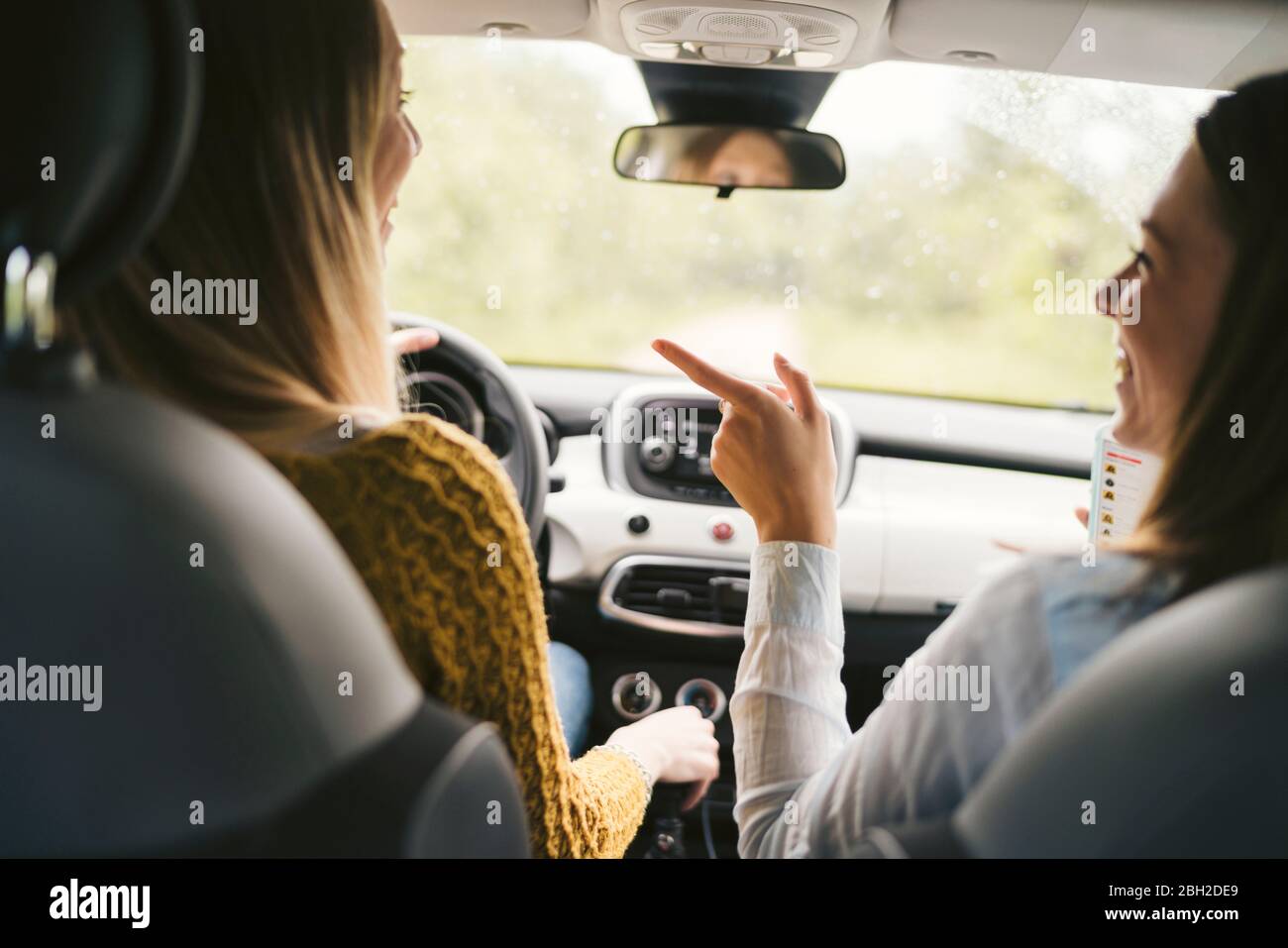 Two young women on a road trip Stock Photo