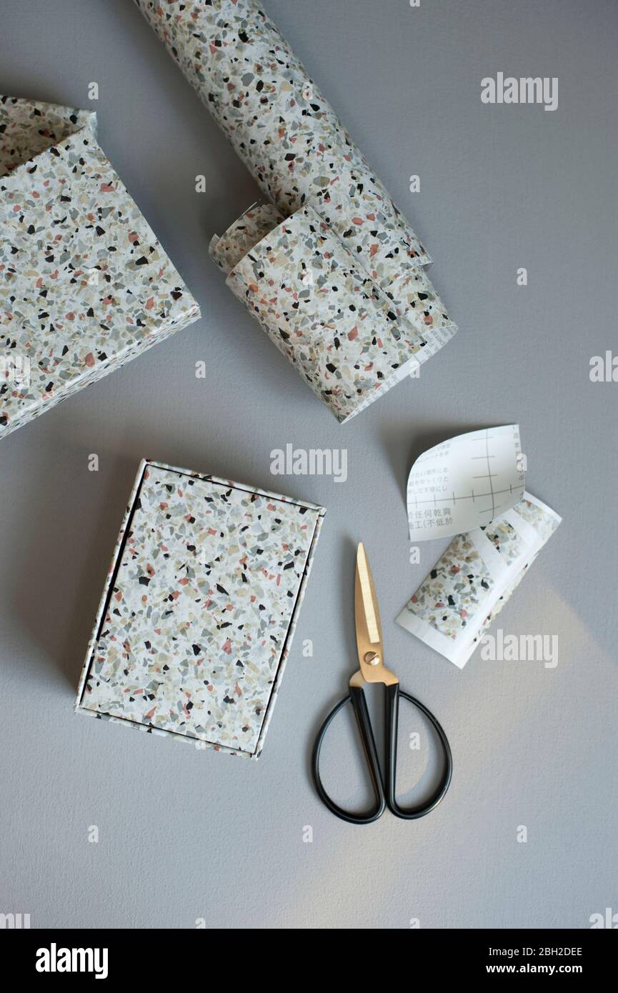 DIY gift boxes decorated with terrazzo adhesive tape Stock Photo
