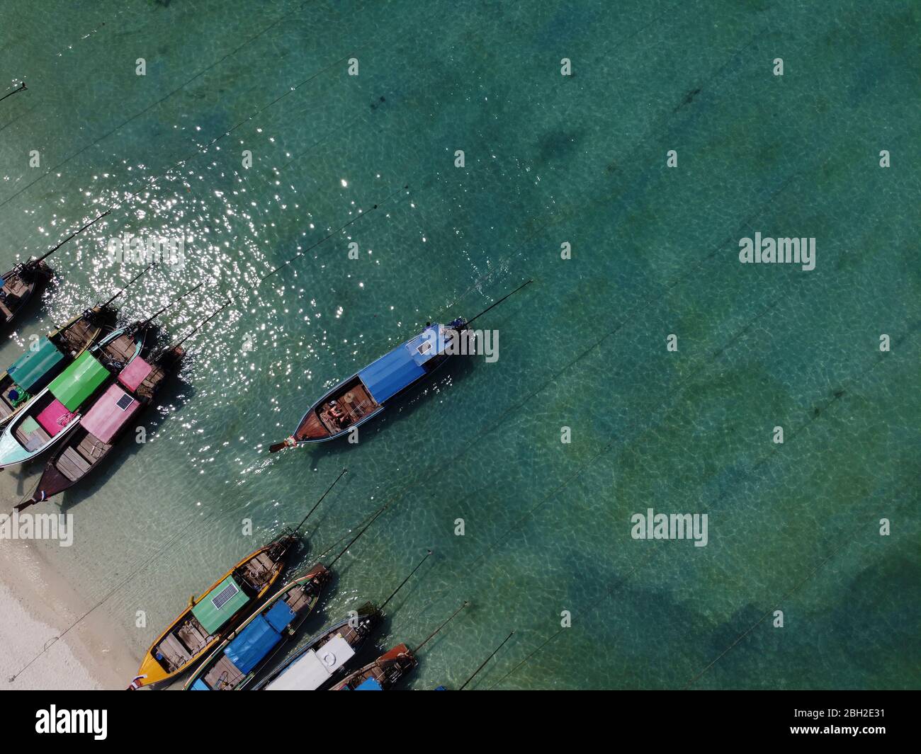 Traditional wooden boats at the beach, Ko Phi Phi Don, Thailand Stock Photo