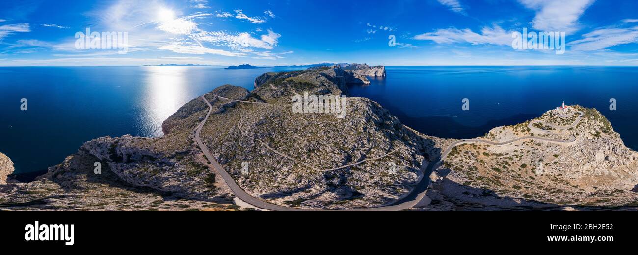 Spain, Mallorca, Pollenca, Drone panorama of Cap de Formentor with clear line of horizon over Mediterranean Sea in background Stock Photo
