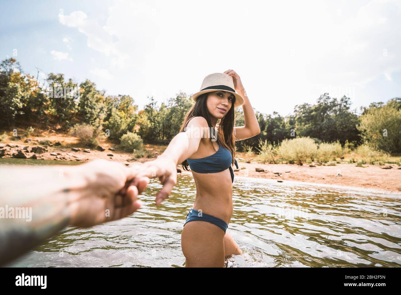 Woman wading hi-res stock photography and images - Alamy