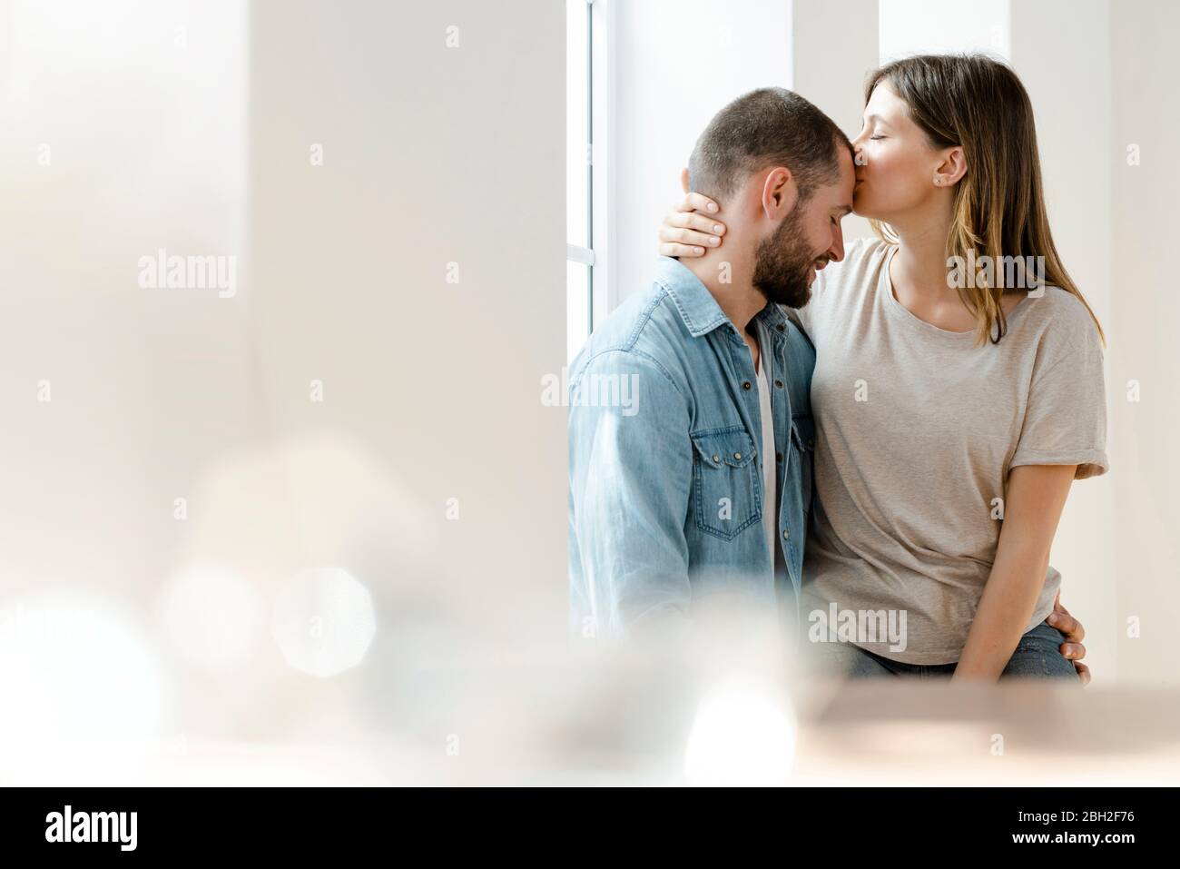 Couple in love at home hi-res stock photography and images - Alamy