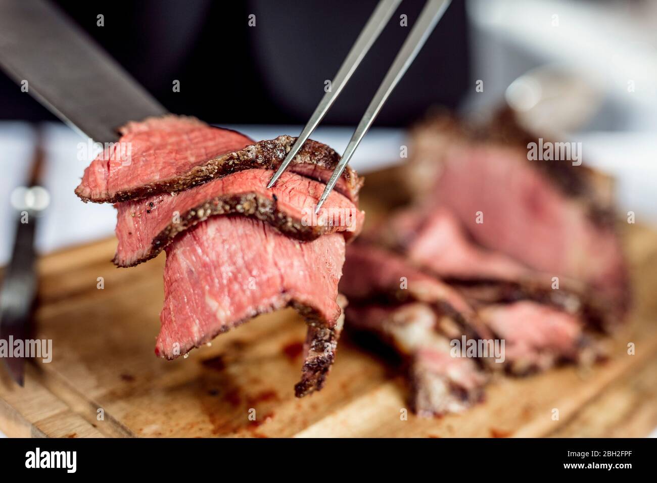 Slices of ready to eat tomahawk steak Stock Photo