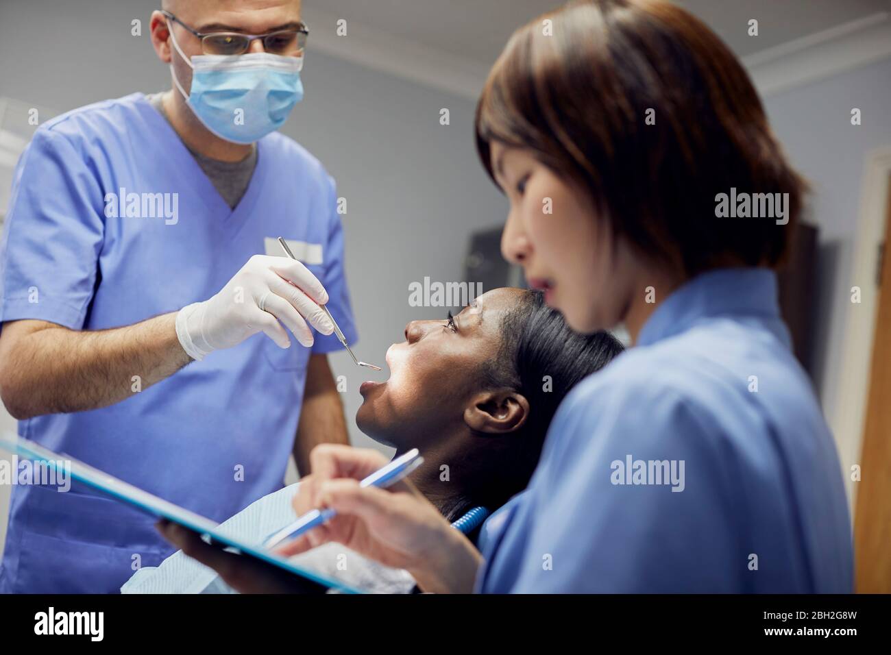 Austin Texas USA: Male patient receiving acupuncture treatment with electrical  stimulation. MR ©Bob Daemmrich Stock Photo - Alamy