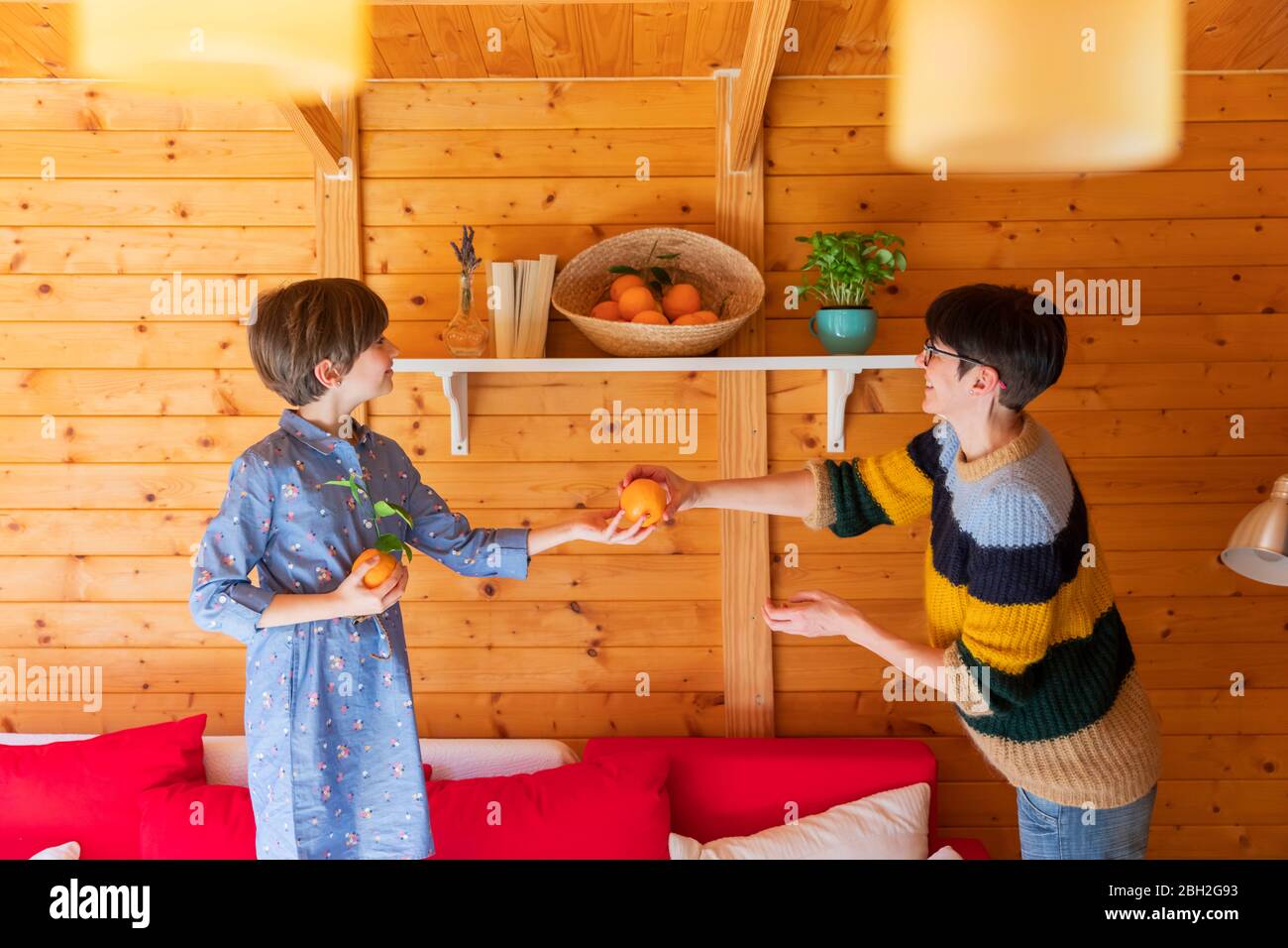 Mother and daughter preparing countryside property to guests
