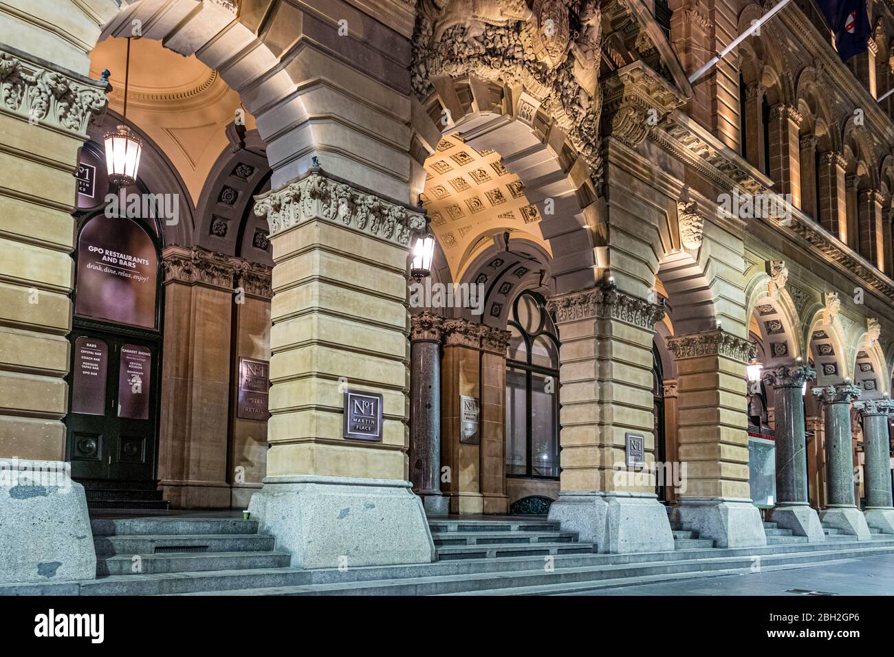 The facade of The General Post Office building at Martin Place at night