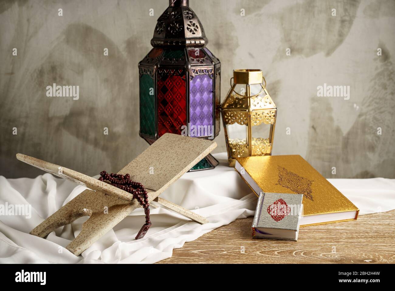Arabic candle lantern with holy quran, Ramadan kareem background Stock Photo