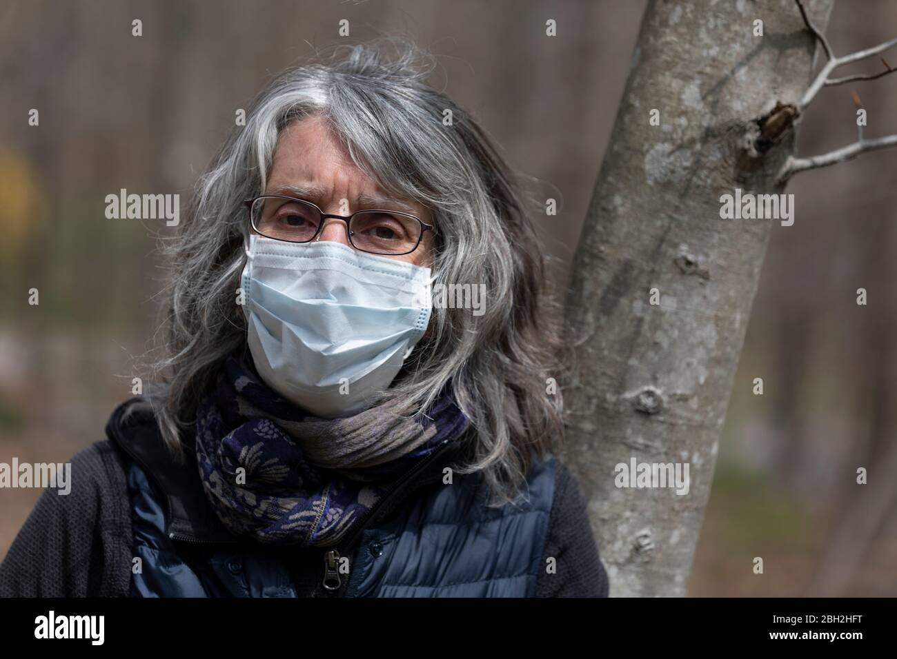 Older woman wearing a face mask hi-res stock photography and images - Alamy