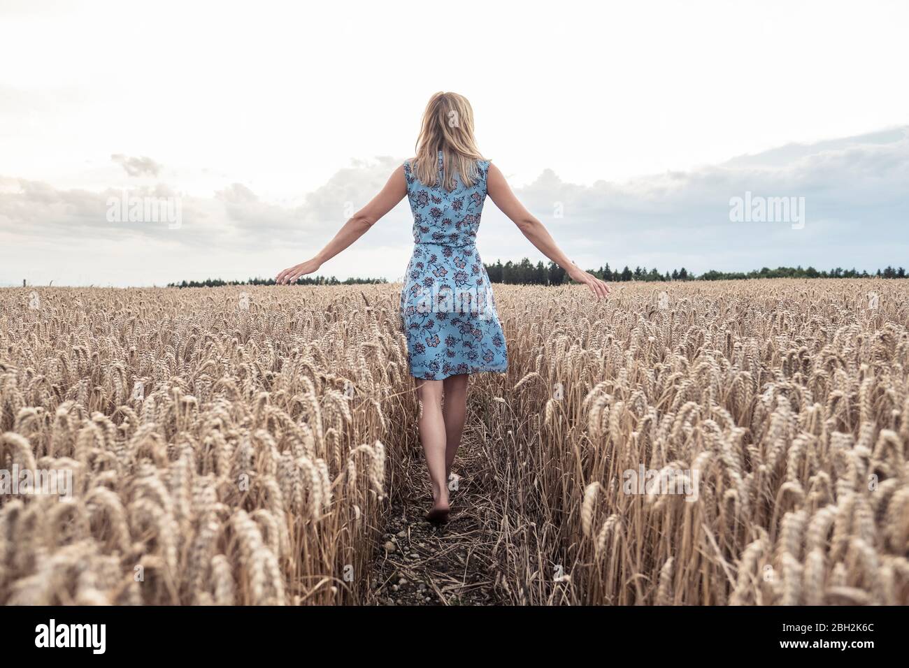 Barefoot woman walking hi-res stock photography and images - Alamy