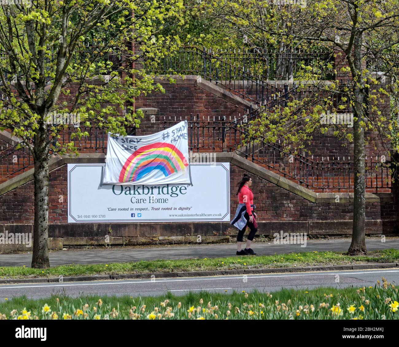 Glasgow, Scotland, UK, 23rd April, 2020: Increasing care home deaths saw a  support for NHS rainbow appear on the Oakbridge care home and an Alltots  nursery home on great western road along