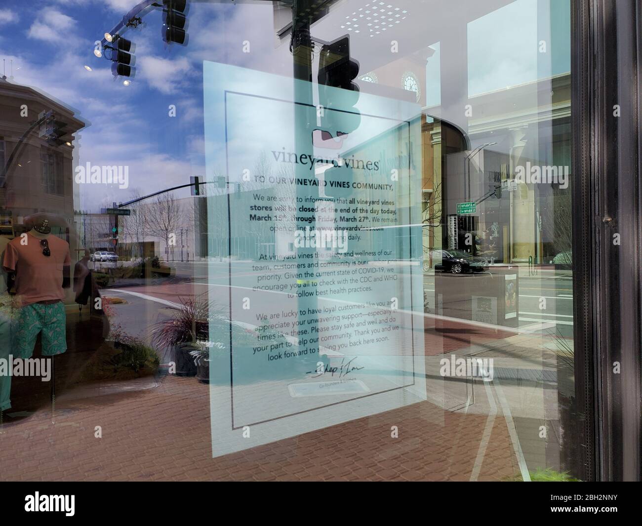 A sign on the window of a small business in Walnut Creek, California announces closure during an outbreak of the COVID-19 coronavirus, March 24, 2020. () Stock Photo