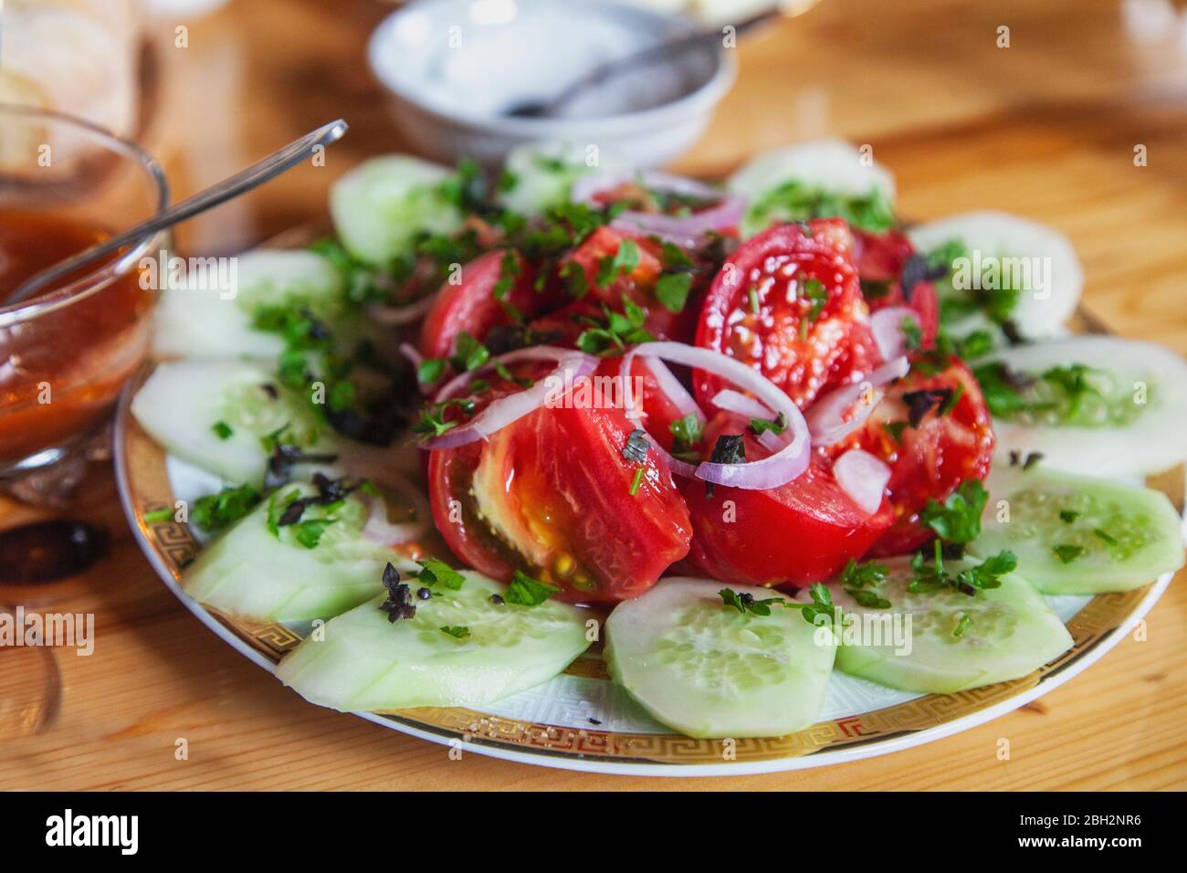 Tomato and cucumber salad Stock Photo