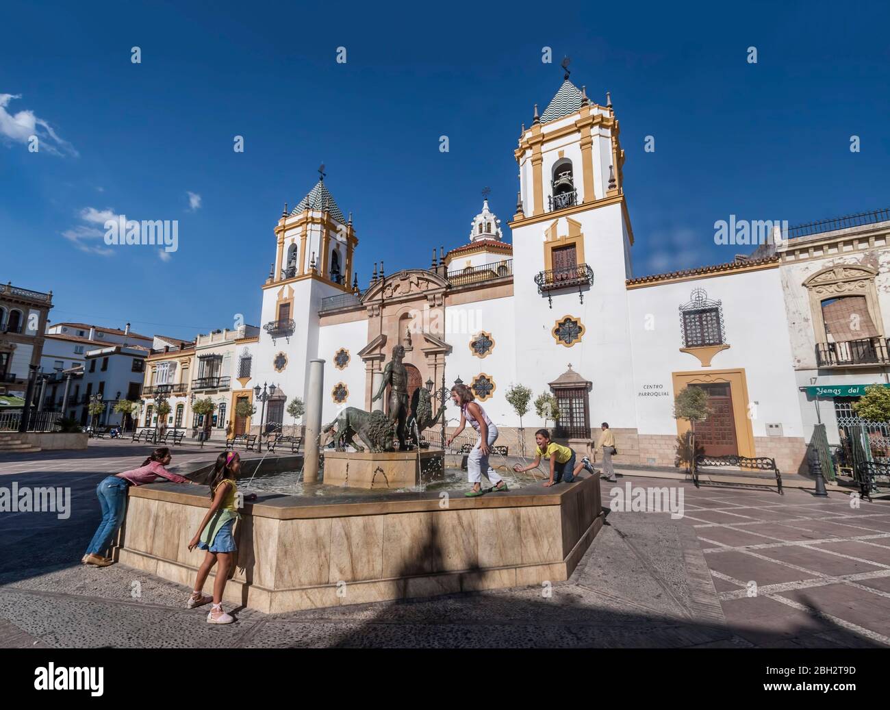 Plaza del Socorro, kids playing at fountain, Ronda, Andalusien Stock Photo
