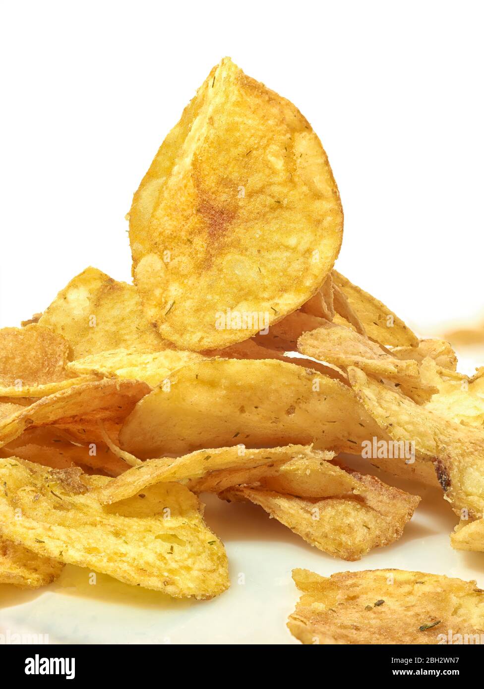 Closeup food portrait of potato chips (potato crisps) against plain