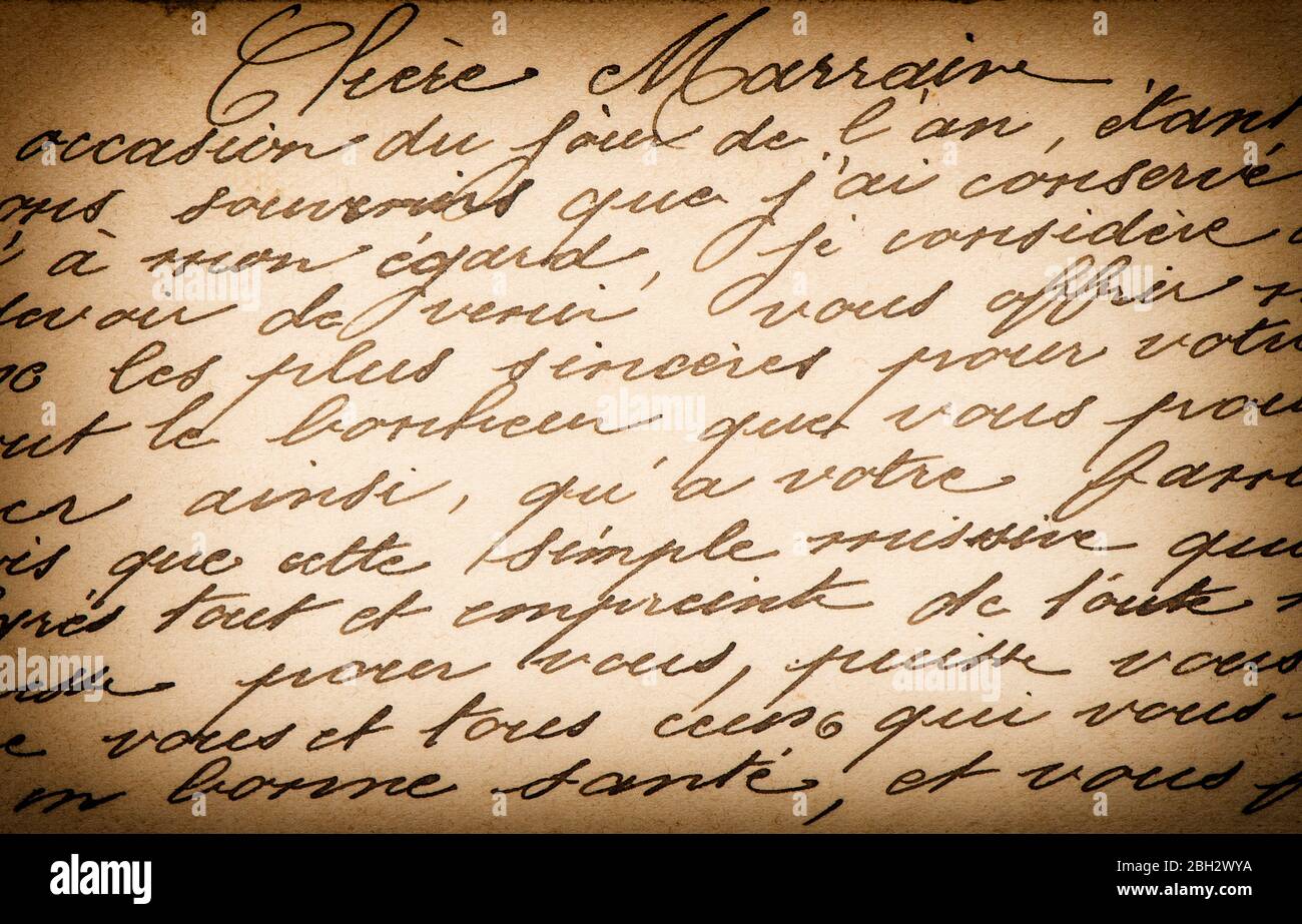 Used paper unreadable handwritten text. Grunge vintage texture background with vignette Stock Photo