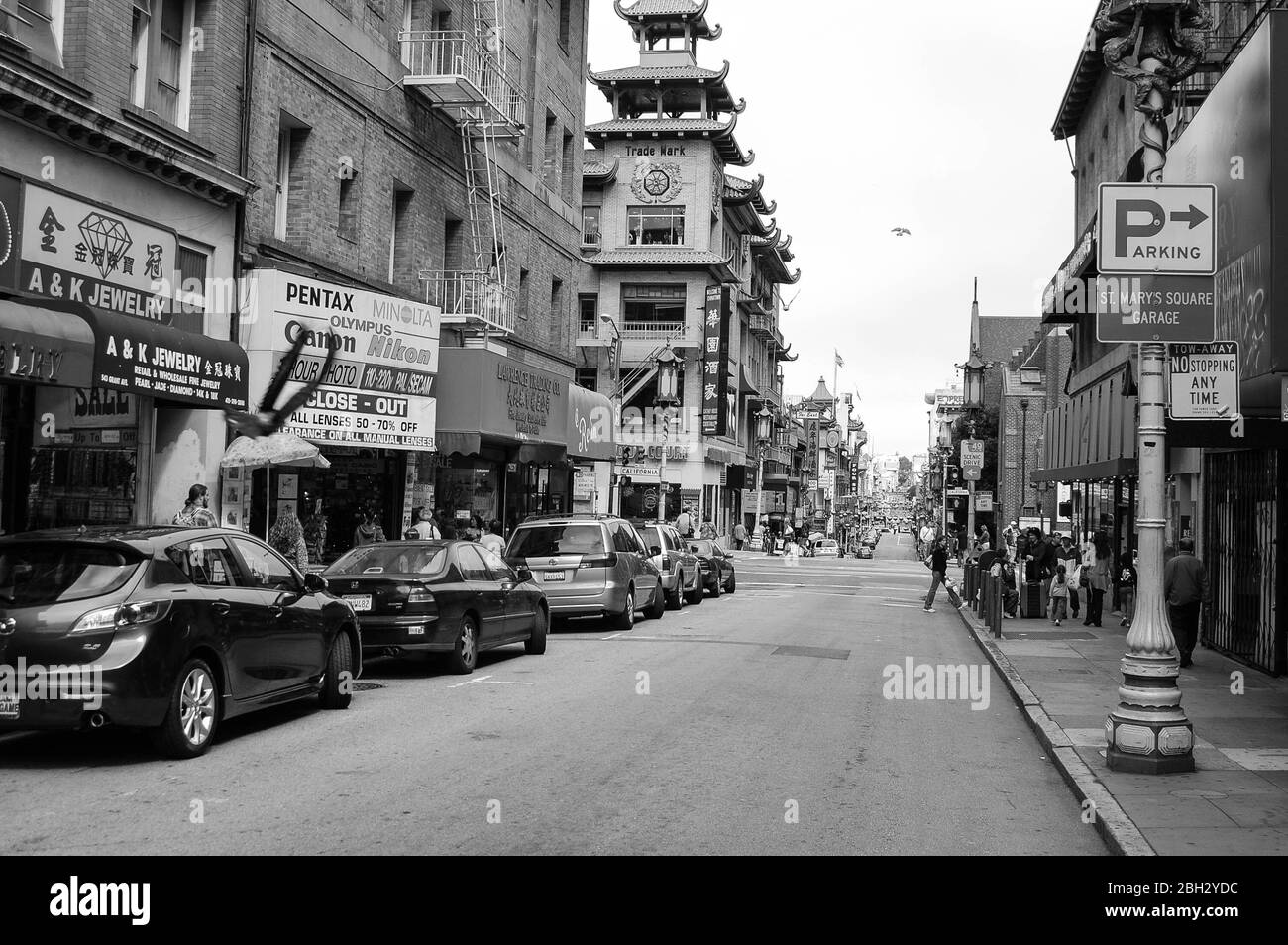 San Francisco Pentax parking China Town lamppost car cars road jewellery chines people person food drink eating restaurant  sign signs flag parking Stock Photo