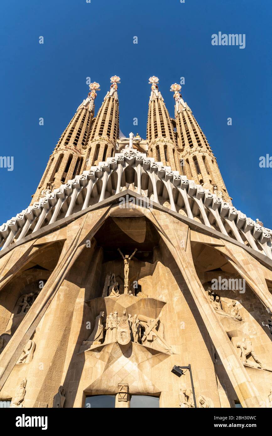 Sagrada Familia Cathedral by Antoni Gaudi, front of west wing, Barcelona Stock Photo