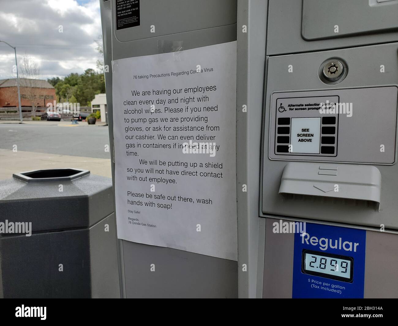 A note is visible on a gas pump detailing cleaning and other special procedures during an outbreak of the COVID-19 coronavirus in Orinda, California, March 30, 2020. () Stock Photo