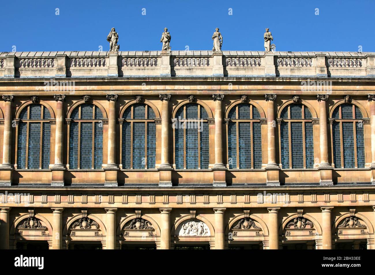 Statues Divinity, Law, Physic (medicine), and Mathematics, by Caius Gabriel Cibber, Wren Library, Nevile’s Court,Trinity College, Cambridge, England, Stock Photo
