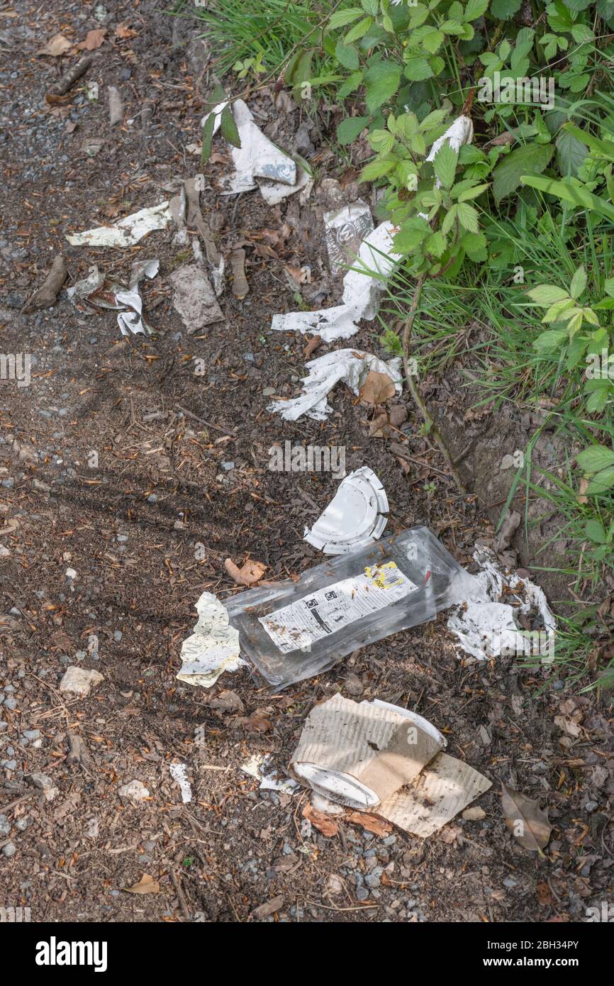 Pile of single use plastic food packaging and takeaway drink cup