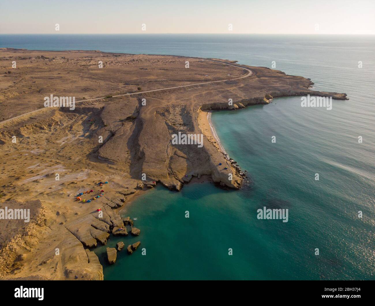 Drone aerial view over the coast of a beach in Hengam in Iran Stock Photo