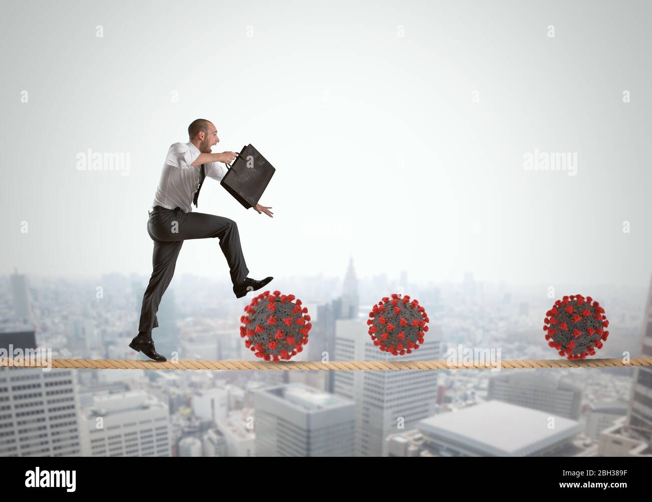 Business man going to work, in trouble on a hanging rope, with viruses lurking Stock Photo