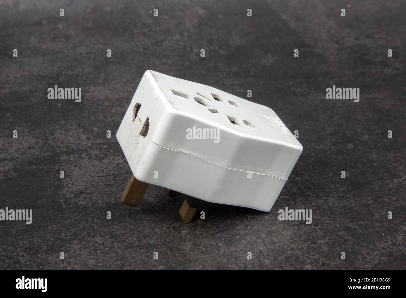 Close up of universal electric multiple socket plug adapters. Used to