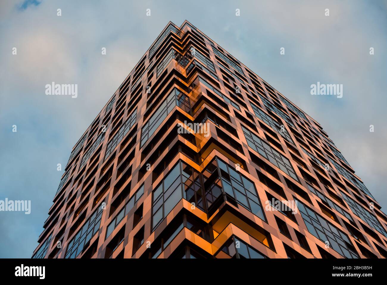 skyscraper with different colors with very unusual windows and shapes ...