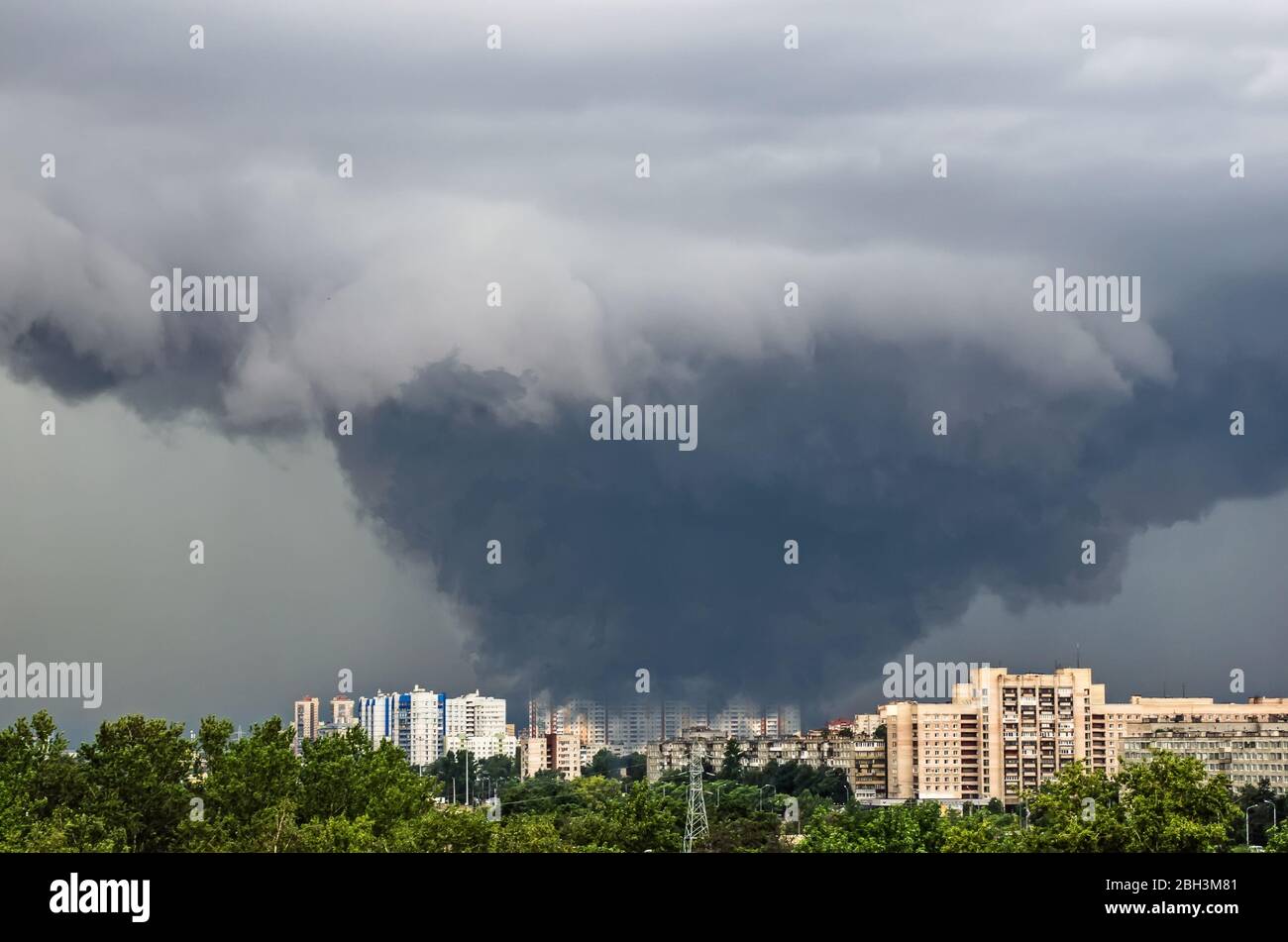 Huge wide powerful catastrophic tornado in a densely populated city power on a scale of F3, EF4-5 Stock Photo