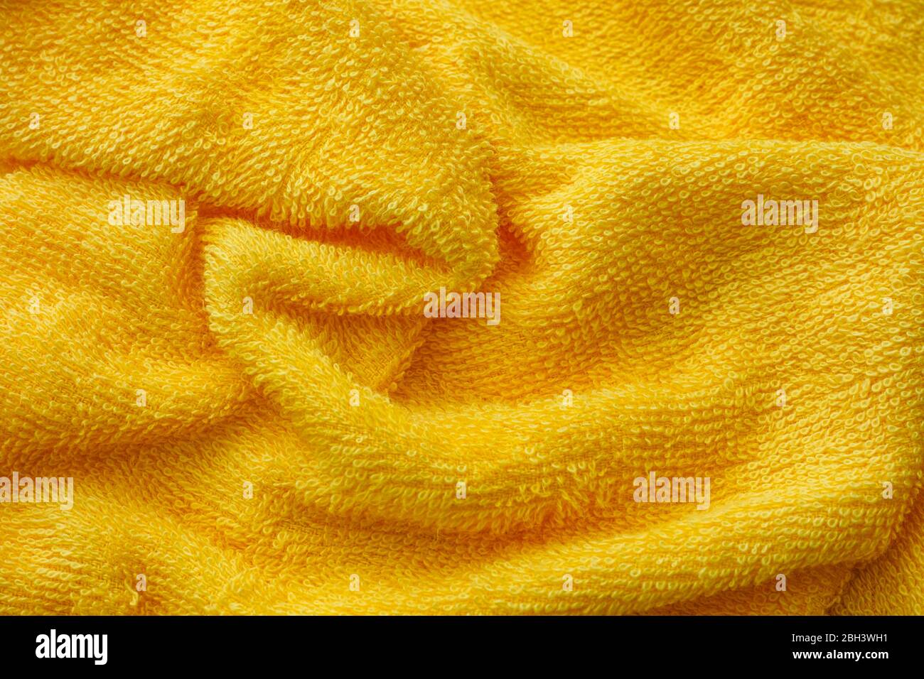 Terry cloth bath towel composition Stock Photo by ©exopixel 58769643