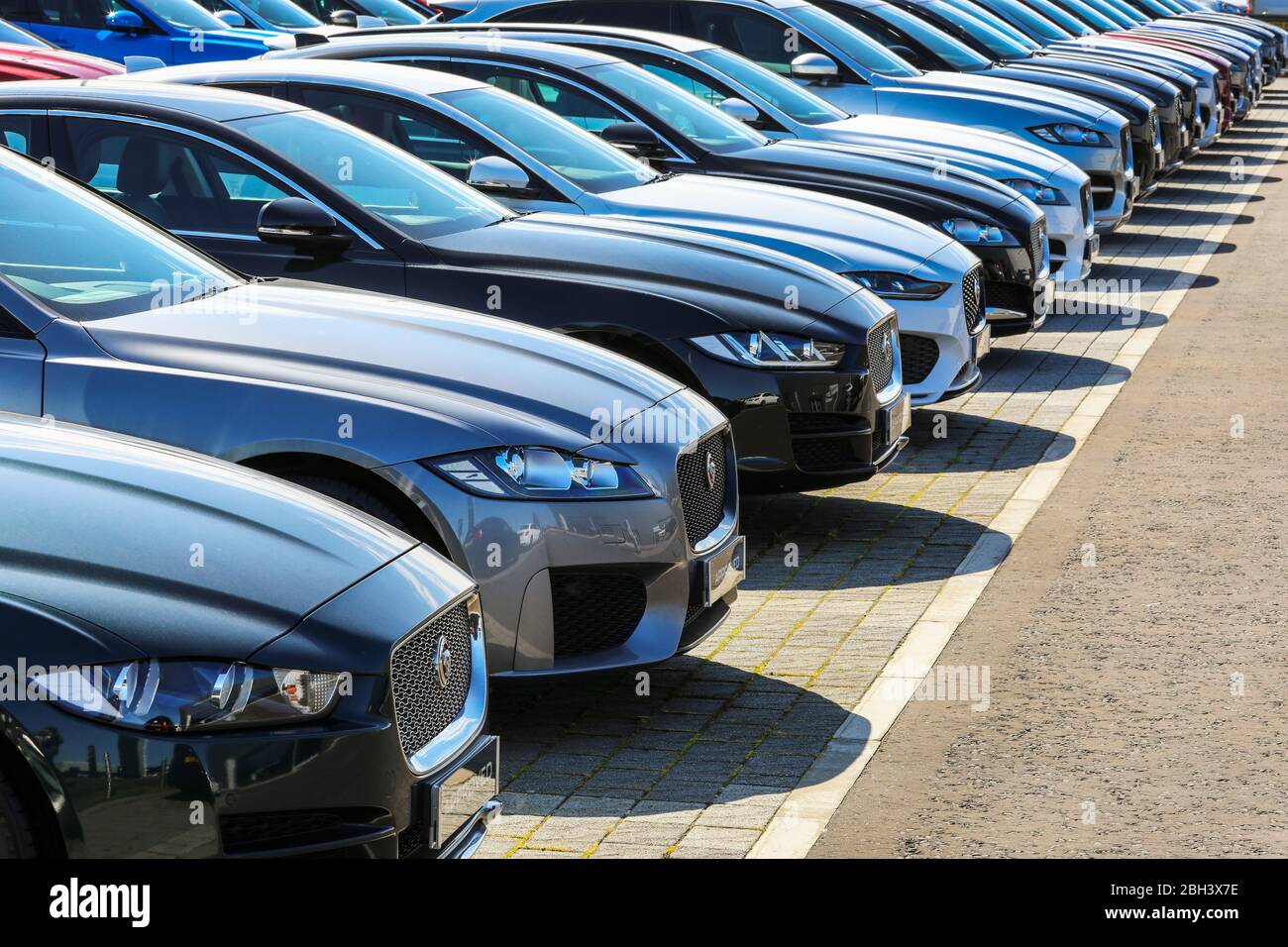 Used Jaguar motor cars for sale in a garage forecourt, Ayr, Scotland Stock Photo