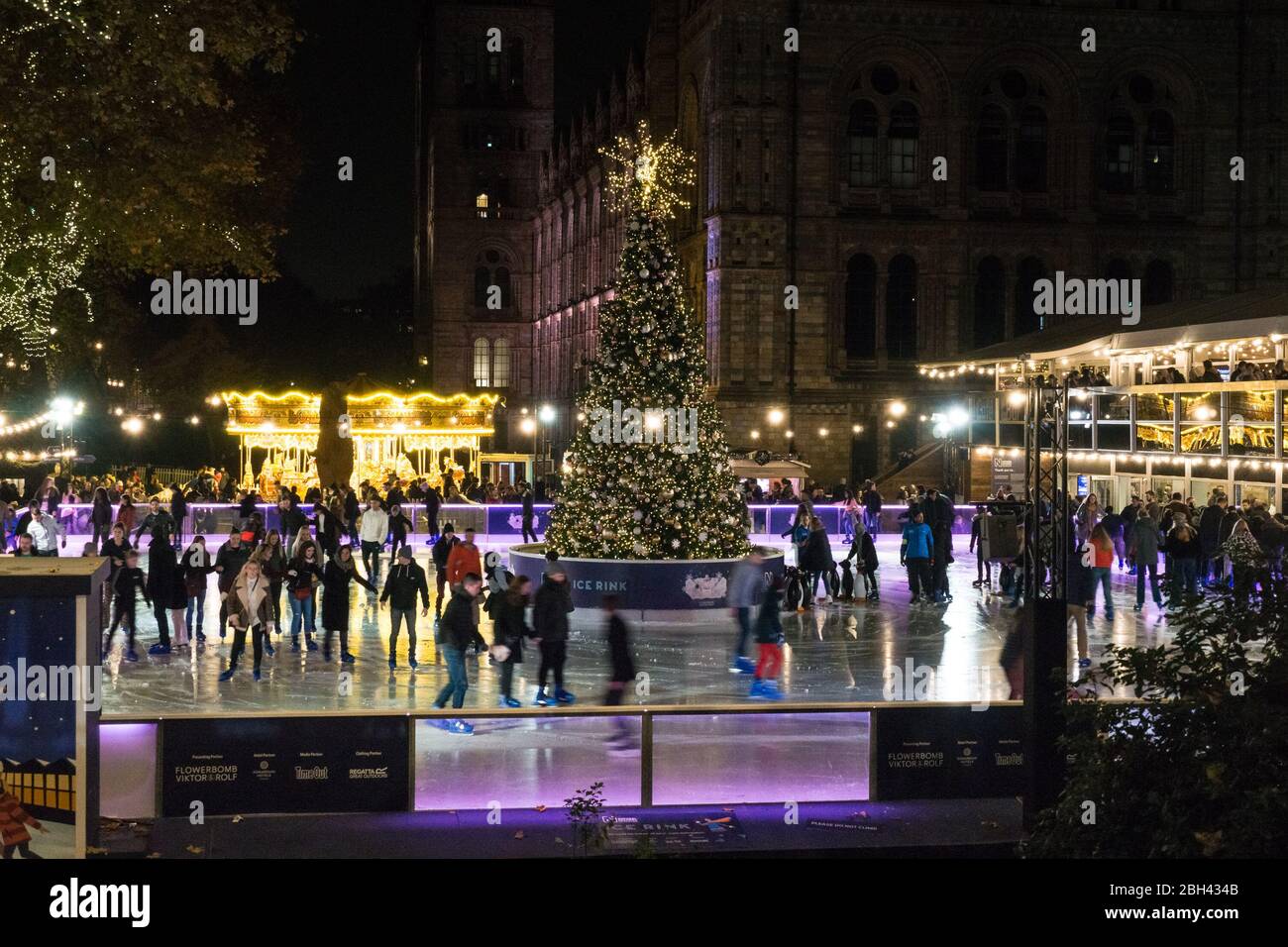 Ice Rink Uk People ice skating at Natural History Museum Ice Rink, London England ...
