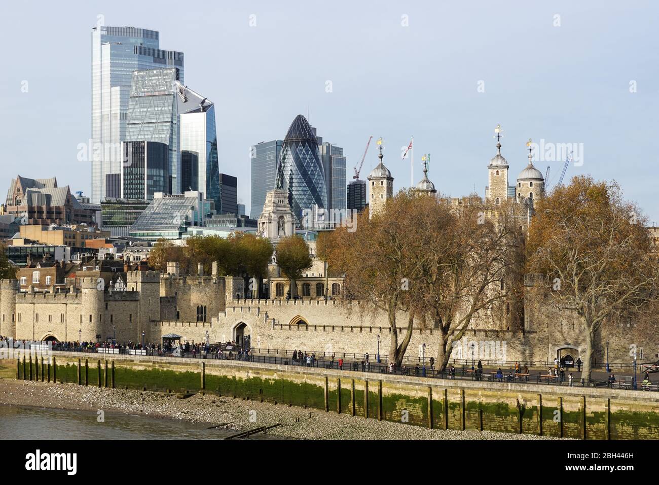 Skyscrapers in the City of London and Tower of London castle, England United Kingdom UK Stock Photo