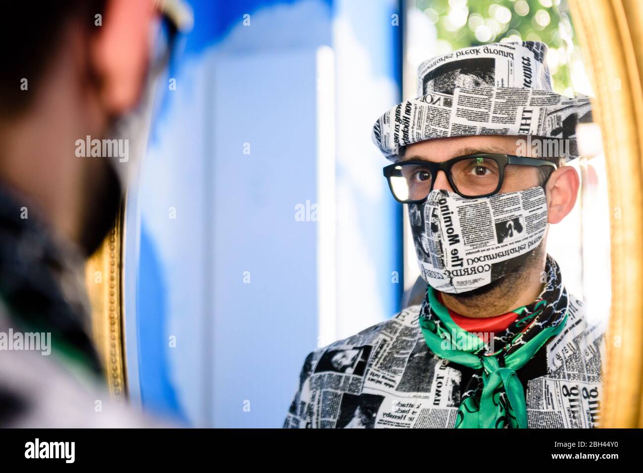 Berlin, Germany. 23rd Apr, 2020. Italian hatter GIUSEPPE TELLA checks