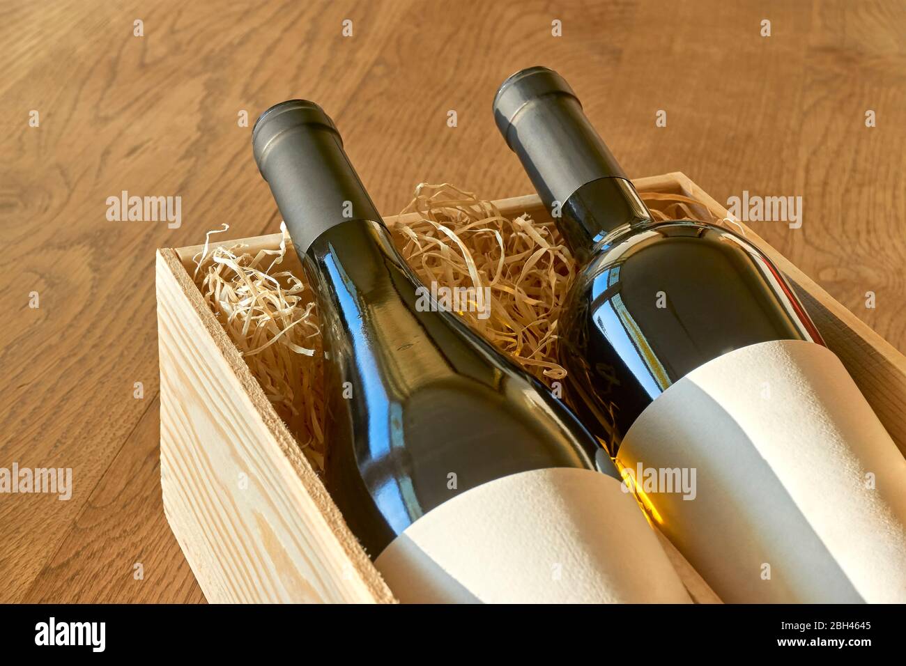Download Bottles Of Red And White Wine In Wooden Gift Box With Straw Glass Bottles With Blank Labels For Use As Mockup Or Template Stock Photo Alamy