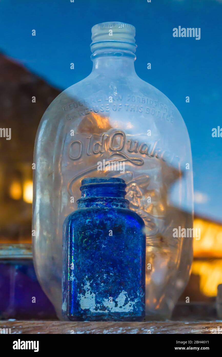 Old glass bottles in the old silver and gold mining ghost town of Berlin in Berlin-Ichthyosaur State Park, Nevada, USA Stock Photo