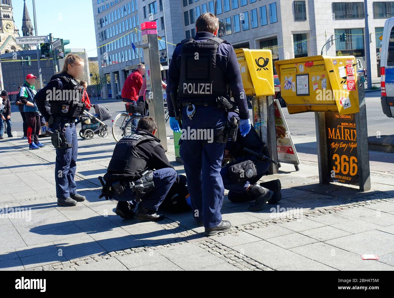 Police in Berlin is helping a victim Stock Photo - Alamy