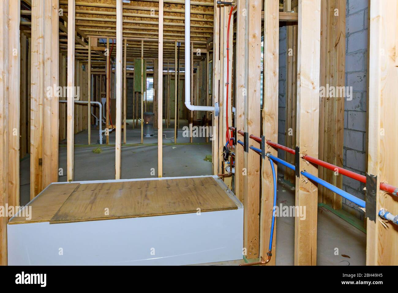 Bathroom shower under plumbing connecting installation pipes for water