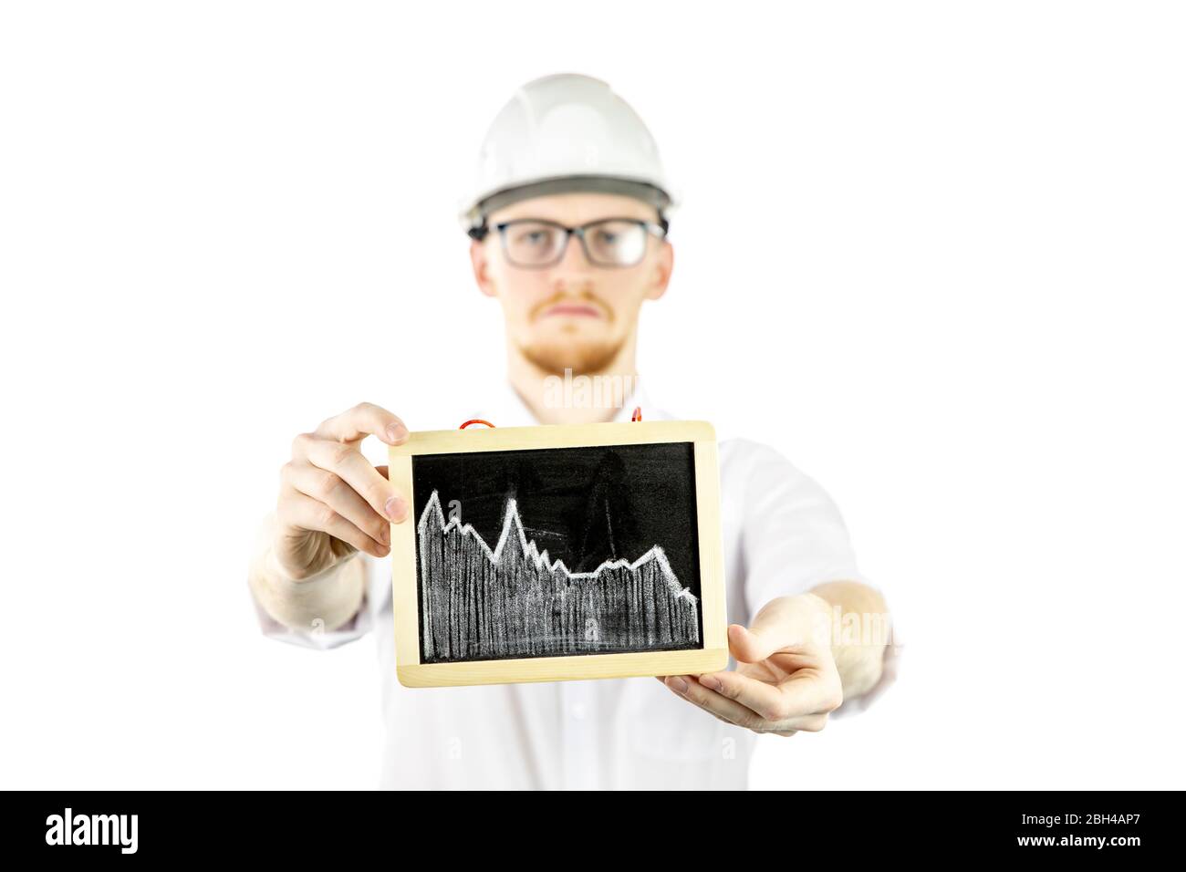 upset distressed businessman keeps falling trend graph looks at camera