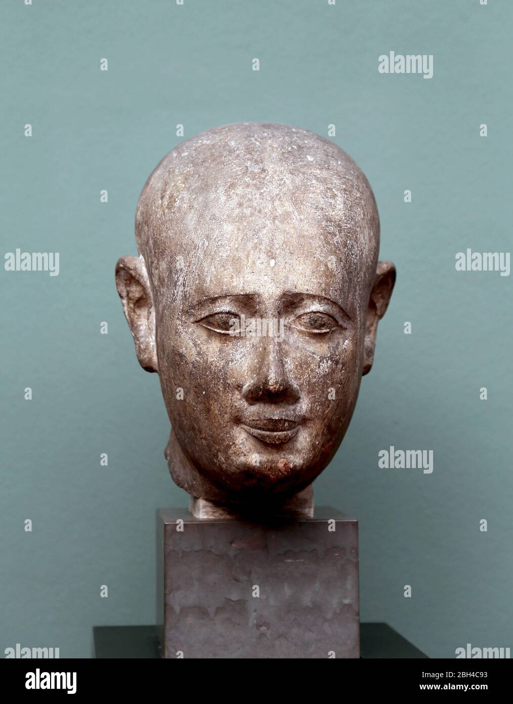 Head from a male statue, unknown origin (3rd century BC.) Ptolemaic Period, Egypt. Limestone. Carlsberg Glyptotek, Copenhagen, Denmark. Stock Photo